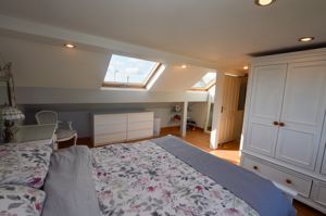 Bedroom One- click for photo gallery